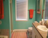 Hall bath with tub and shower